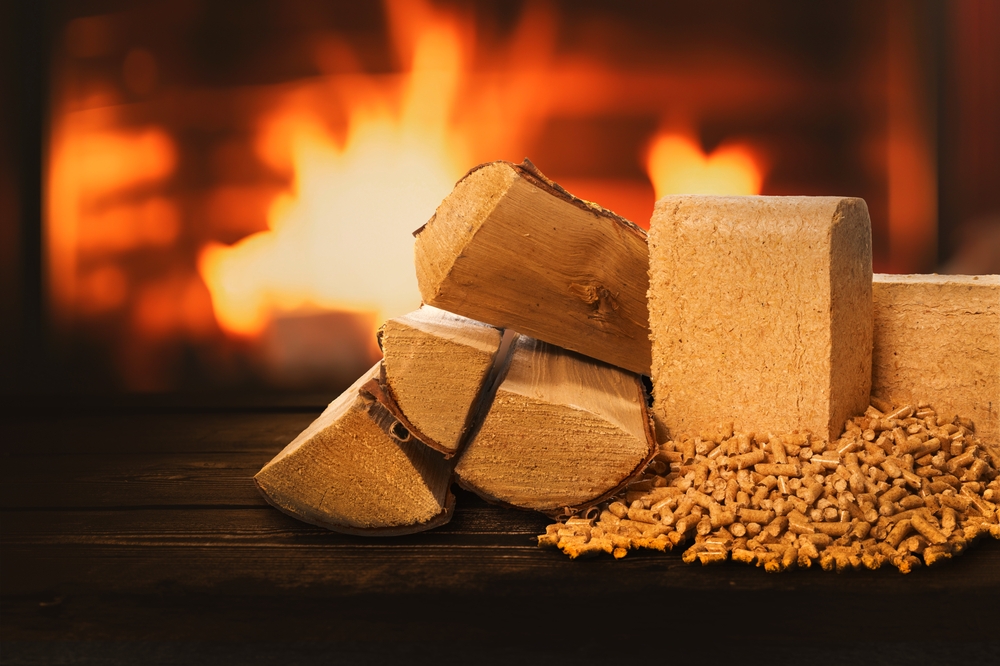 Biomass,Heating.,Firewood,,Pellets,And,Briquettes,On,Wood,Burning,Fireplace